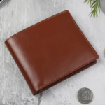 Keep your valubles safe in this Finnan ripper wallet. Secured with hook and loop tape, this handy pocket wallet has plenty of space for cash, cards and a zipped pocket for your spare change.
• Hook and loop tape fastening
• Note compartment
• Card slip pockets
• Zipped coin pocket