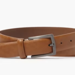 Our Taylor & Wright Black Carbon Belt is a sleek finishing touch for any smart outfit. Designed with a smooth black strap and a modern carbon-effect buckle, this belt brings a refined and contemporary edge to your formal or office wear.

Classic black strap
Carbon-effect buckle detail
Smart and versatile design
Ideal for work or occasion dressing