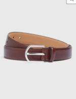 Our Tan PU Brogue Belt is a must-have accessory for any discerning gentleman. Expertly crafted from premium fabrics, this belt exudes luxury and sophistication. The timeless tan hue adds a touch of elegance to any outfit, featuring a silver hardware buckle and intricate brogue detailing that adds a touch of distinction. 